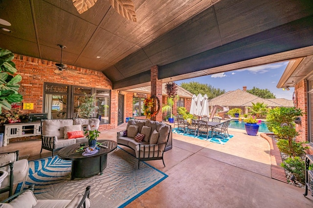 view of patio / terrace featuring an outdoor pool and an outdoor living space