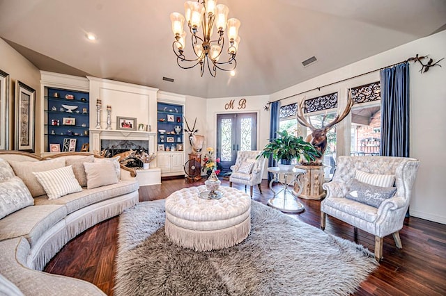 living room featuring lofted ceiling, a premium fireplace, visible vents, and wood finished floors