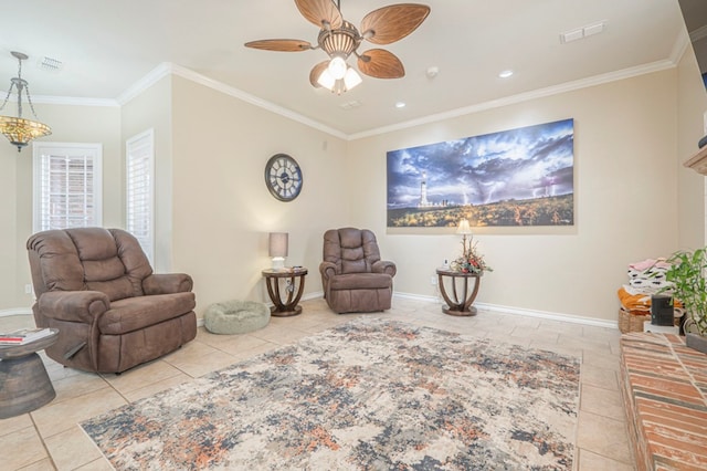 living area with ceiling fan, ornamental molding, and light tile patterned floors