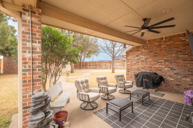 view of patio / terrace with area for grilling and ceiling fan