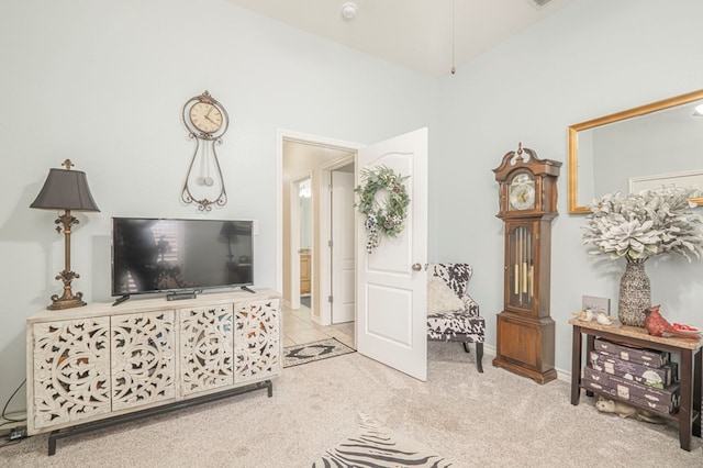 living room with light colored carpet