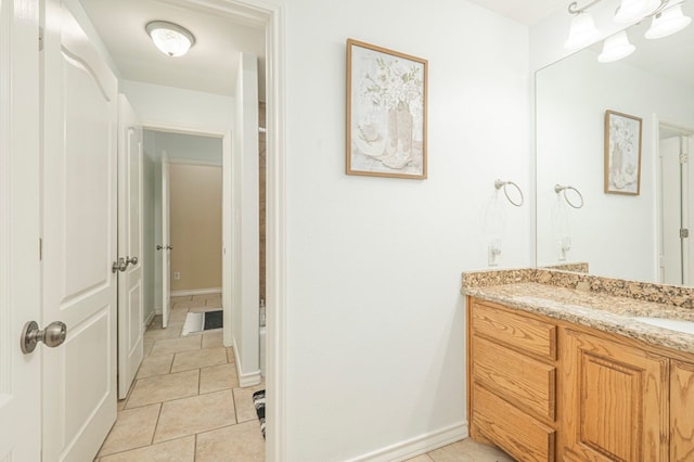 bathroom featuring vanity and tile patterned flooring