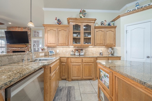 kitchen with crown molding, light tile patterned floors, dishwasher, pendant lighting, and decorative backsplash