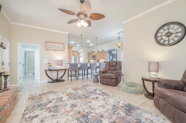 living room featuring crown molding, light tile patterned flooring, and ceiling fan