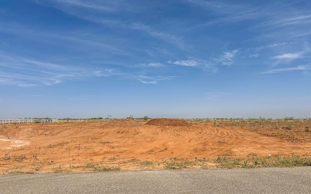 exterior space with a rural view