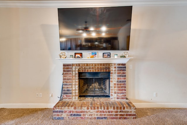 418 Orourke, Midland, TX 79706 - detailed view of carpet floors, baseboards, a fireplace, and crown molding