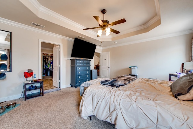 418 Orourke, Midland, TX 79706 - bedroom with a raised ceiling, crown molding, light carpet, a spacious closet, and a closet