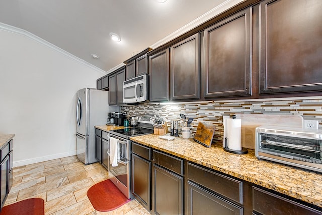 418 Orourke, Midland, TX 79706 - kitchen with appliances with stainless steel finishes, baseboards, decorative backsplash, lofted ceiling, and dark brown cabinets