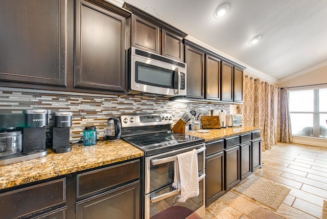 418 Orourke, Midland, TX 79706 - kitchen featuring appliances with stainless steel finishes, lofted ceiling, dark brown cabinets, backsplash, and ornamental molding