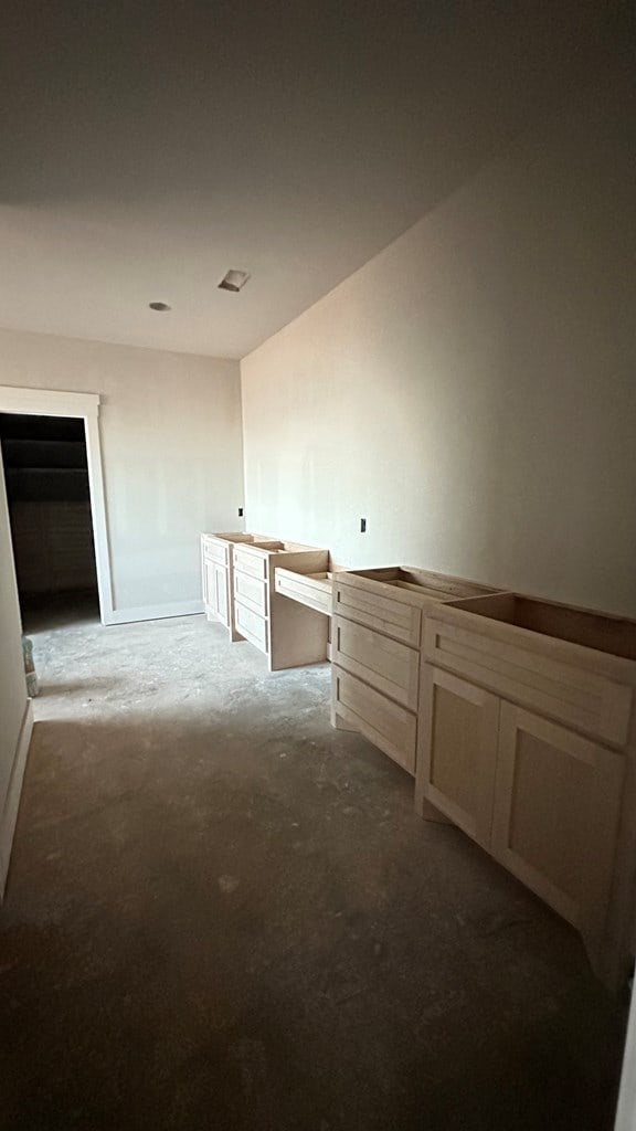 2815 S County Rd 1092, Midland, TX 79706 - spare room featuring carpet flooring and baseboards