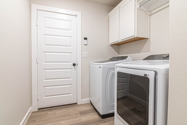 2013 Swenson St, Midland, TX 79705 - washroom with cabinet space, separate washer and dryer, light wood-type flooring, and baseboards