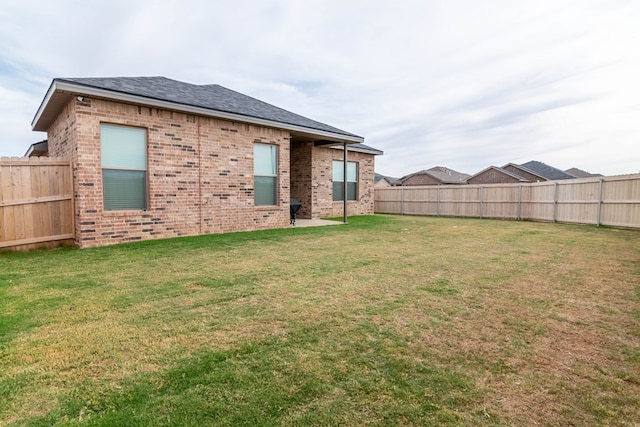 2013 Swenson St, Midland, TX 79705 - back of property featuring brick siding and roof with shingles
