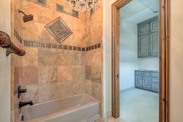 full bath with baseboards, shower / bathtub combination, and a notable chandelier