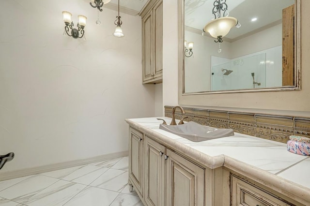 full bath with vanity, ornamental molding, marble finish floor, a shower, and baseboards