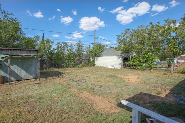 view of yard with a storage shed