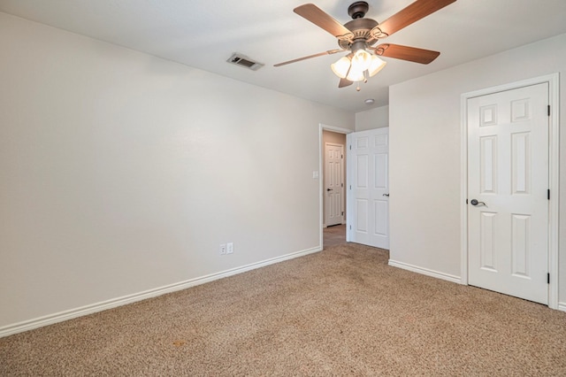 unfurnished bedroom featuring ceiling fan and carpet floors