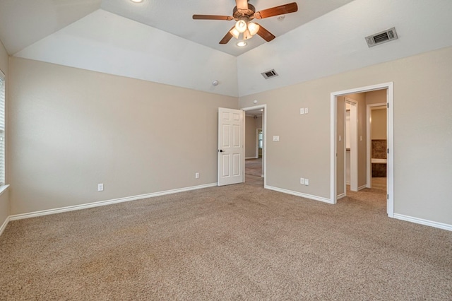 unfurnished bedroom featuring ceiling fan, carpet, and lofted ceiling