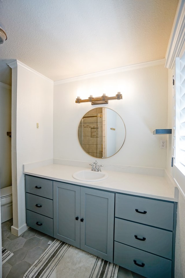 3000 Sentinel Ave, Midland, TX 79701 - bathroom with crown molding, vanity, and a textured ceiling