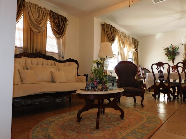 sitting room with tile patterned flooring