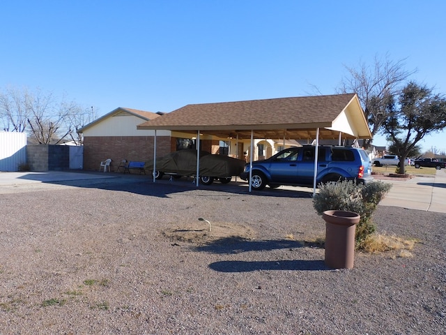 view of car parking featuring a carport