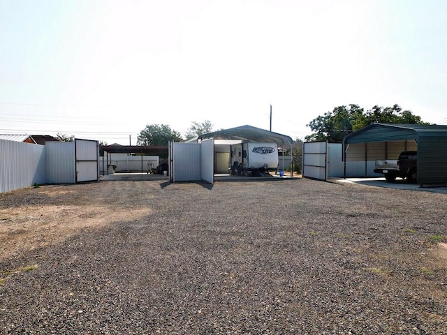 view of yard featuring a carport