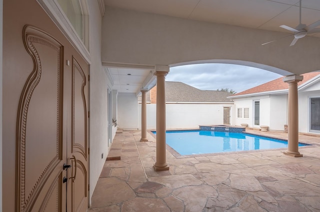 view of pool featuring ceiling fan and a patio area