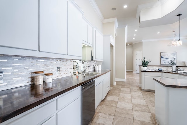 kitchen featuring dishwasher, white cabinets, sink, decorative light fixtures, and a chandelier