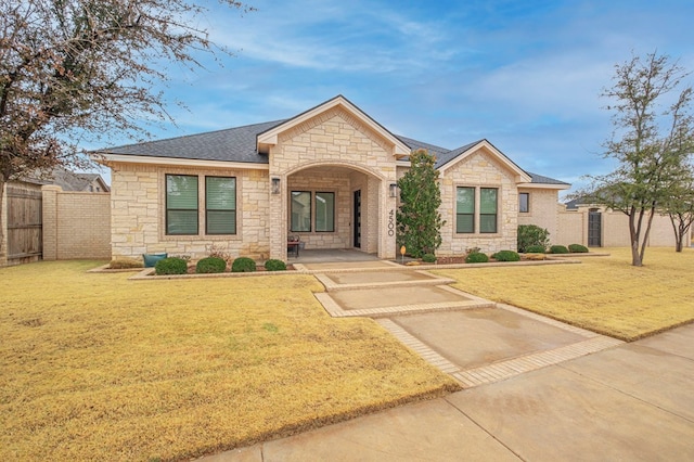 view of front of house with a front lawn