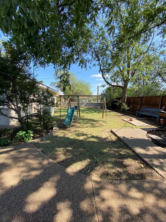 view of yard with a playground