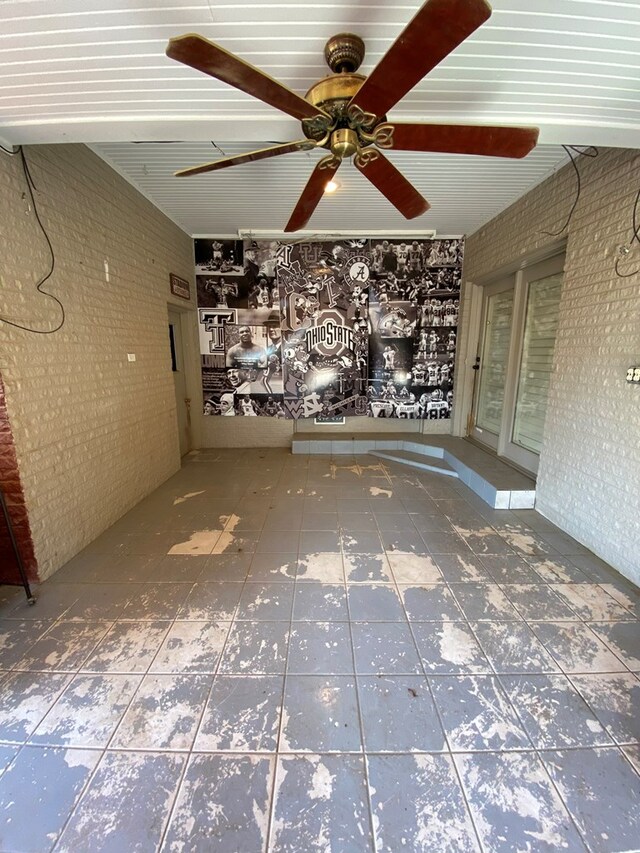 view of patio featuring ceiling fan