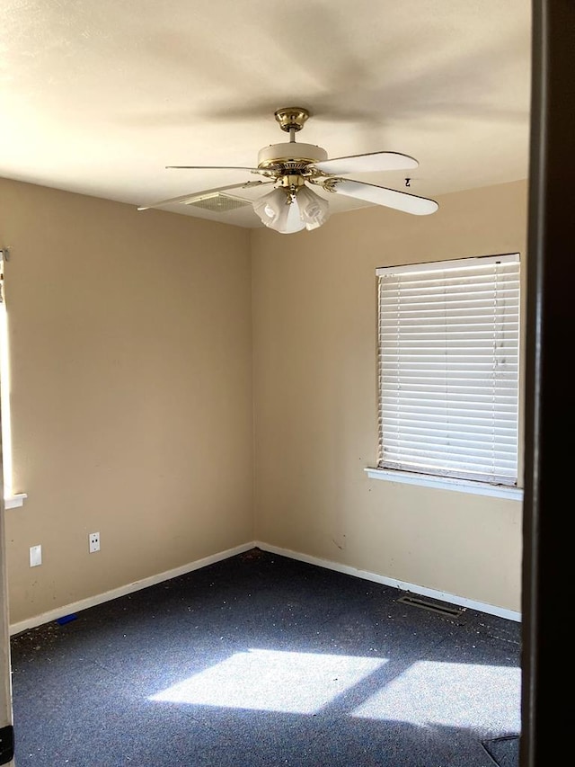 spare room featuring ceiling fan