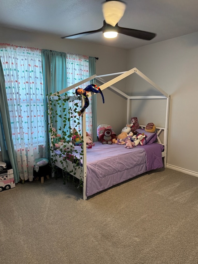 bedroom with carpet floors and ceiling fan