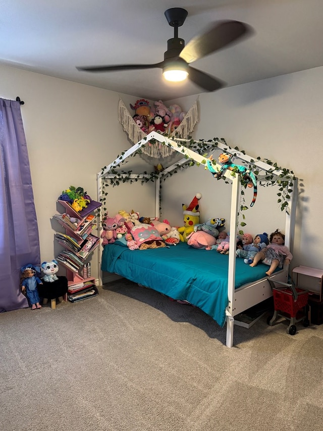 bedroom featuring ceiling fan and carpet flooring