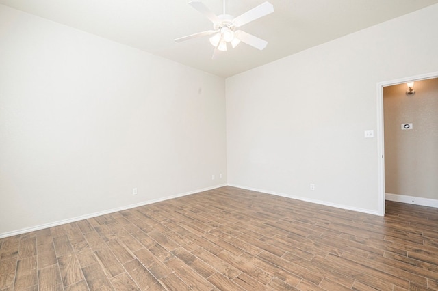 spare room featuring ceiling fan and wood-type flooring