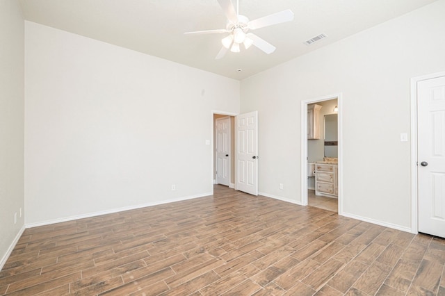 unfurnished bedroom with hardwood / wood-style floors and ceiling fan