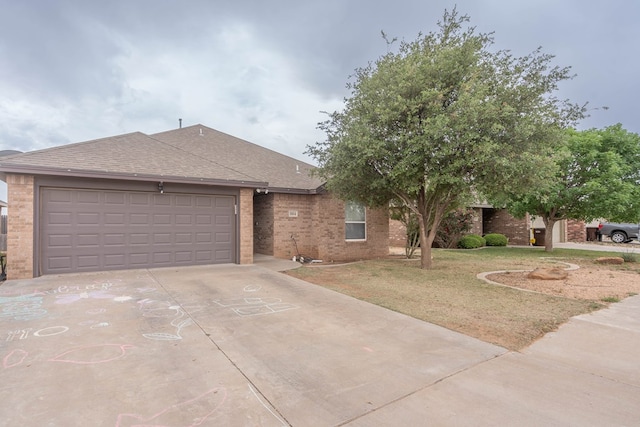 ranch-style house with brick siding, an attached garage, roof with shingles, and driveway