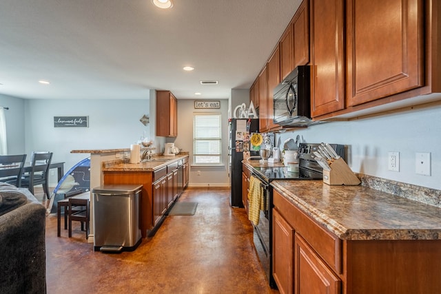 kitchen featuring a peninsula, baseboards, brown cabinets, finished concrete floors, and black appliances