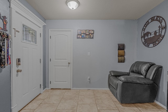 1004 Jefferson St, Odessa, TX 79761 - foyer with baseboards and light tile patterned floors