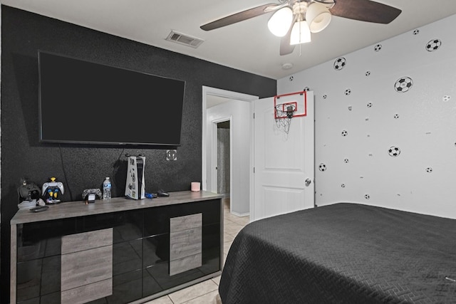 1004 Jefferson St, Odessa, TX 79761 - bedroom featuring light tile patterned floors and a ceiling fan