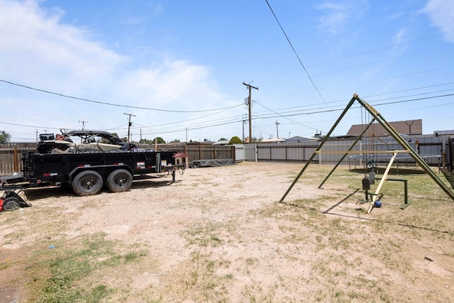 1004 Jefferson St, Odessa, TX 79761 - fenced backyard with a playground