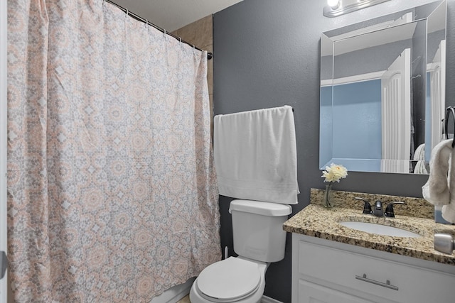 1004 Jefferson St, Odessa, TX 79761 - bathroom featuring vanity, toilet, and a shower with curtain