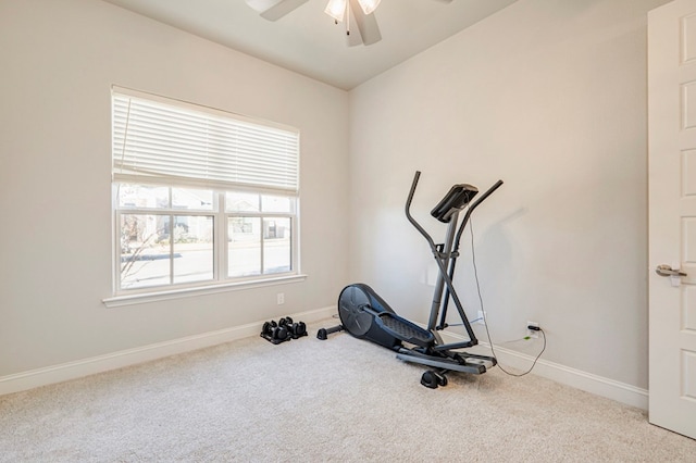 workout area featuring lofted ceiling, a ceiling fan, carpet flooring, and baseboards