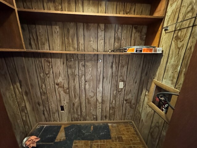 2203 40th St, Snyder, TX 79549 - laundry room featuring wooden walls