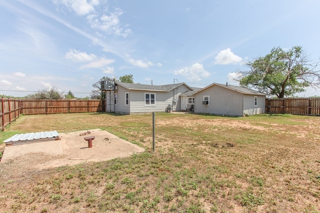 2101 Grace St, Big Spring, TX 79720 - rear view of property with a fenced backyard