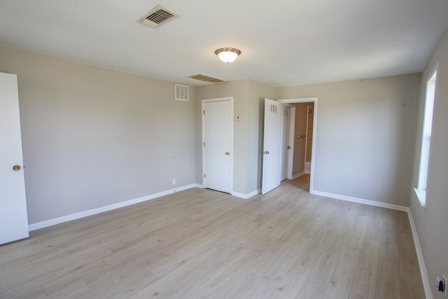 2101 Grace St, Big Spring, TX 79720 - empty room featuring light wood-type flooring and plenty of natural light