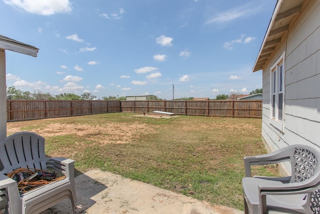 2101 Grace St, Big Spring, TX 79720 - fenced backyard featuring a patio