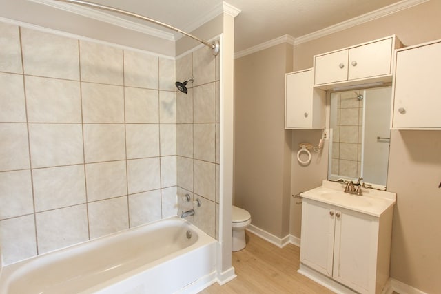 2101 Grace St, Big Spring, TX 79720 - full bathroom featuring wood finished floors, ornamental molding, vanity, and shower / bath combination