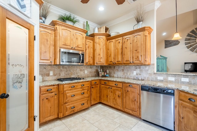 3124 Patrick Pl, Midland, TX 79705 - kitchen featuring appliances with stainless steel finishes, ornamental molding, backsplash, light tile patterned floors, and light stone counters