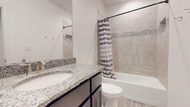 bathroom featuring vanity, toilet, and shower / tub combo with curtain