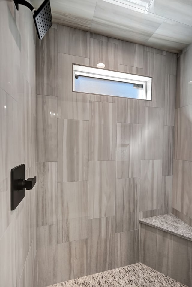 details featuring tiled shower